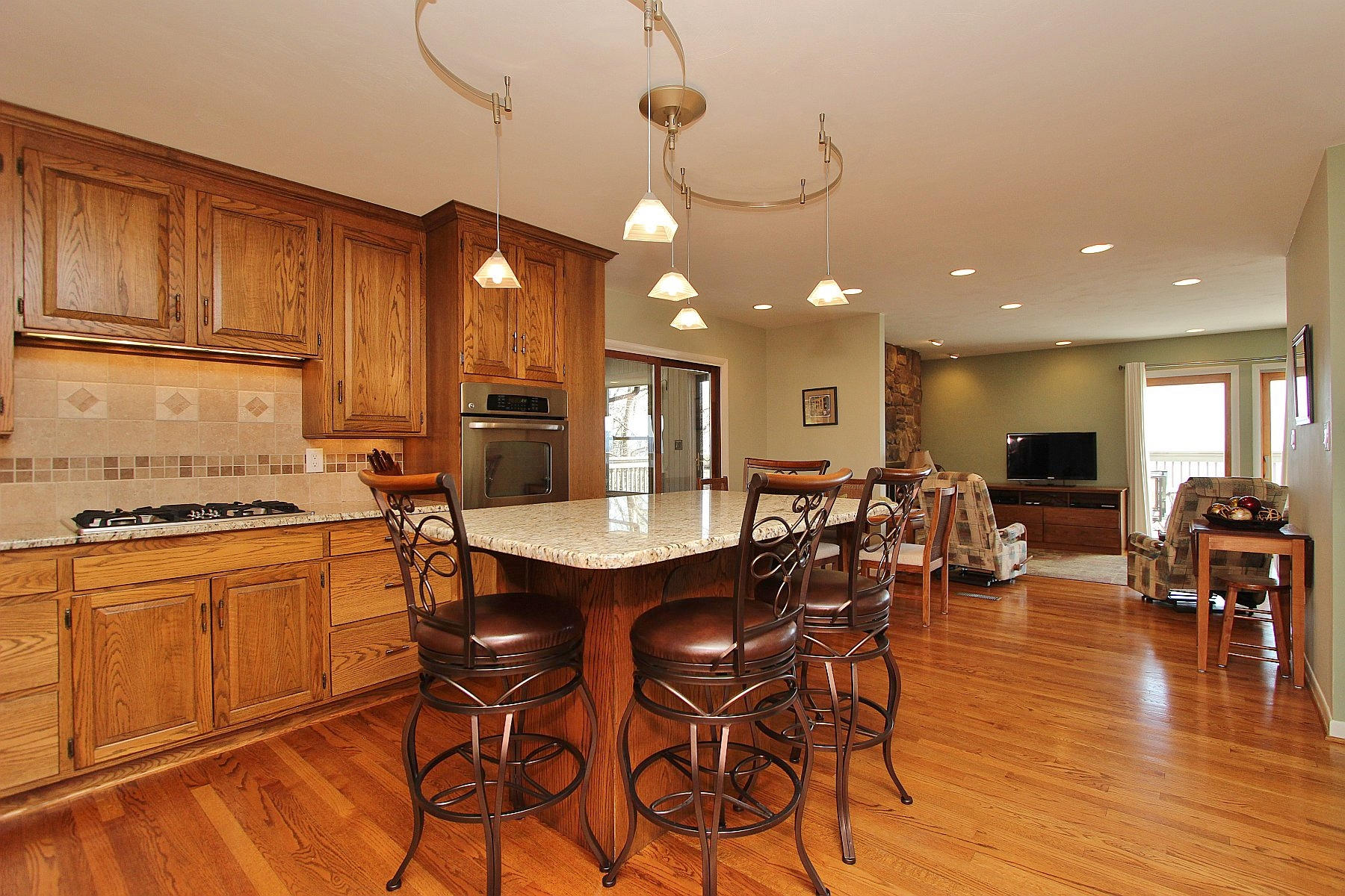 840 Brushy Ridge Road Salem, VA 24153 - Photo 38 of 86 a kitchen with stainless steel appliances a dining table chairs stove and cabinets