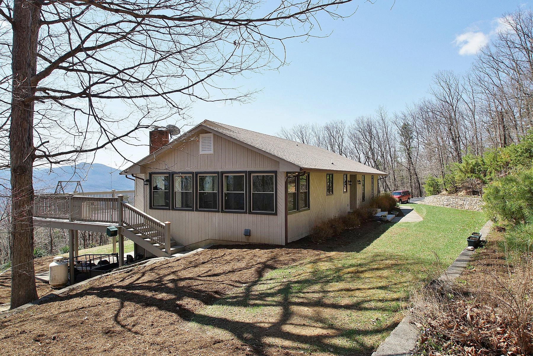 840 Brushy Ridge Road Salem, VA 24153 - Photo 5 of 86 a front view of a house with a yard and trees