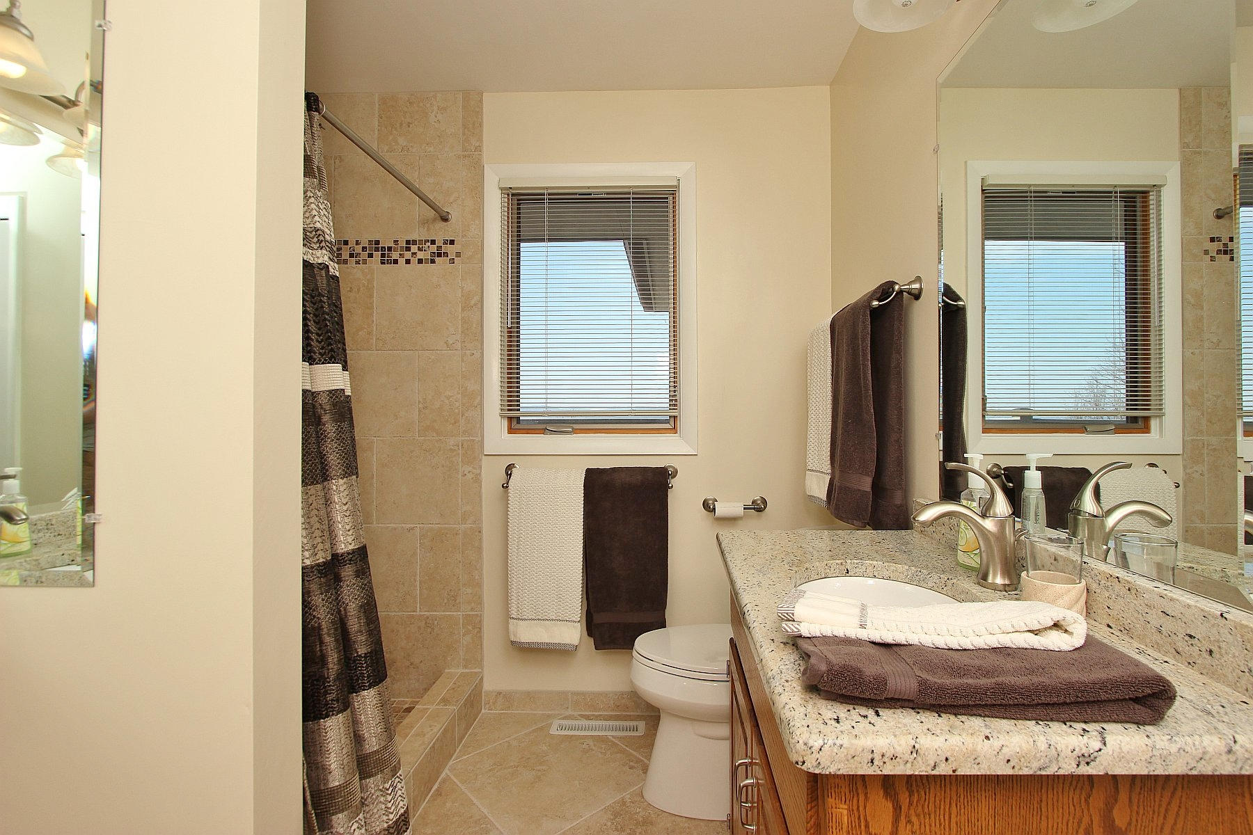 840 Brushy Ridge Road Salem, VA 24153 - Photo 44 of 86 a bathroom with a granite countertop sink and a mirror