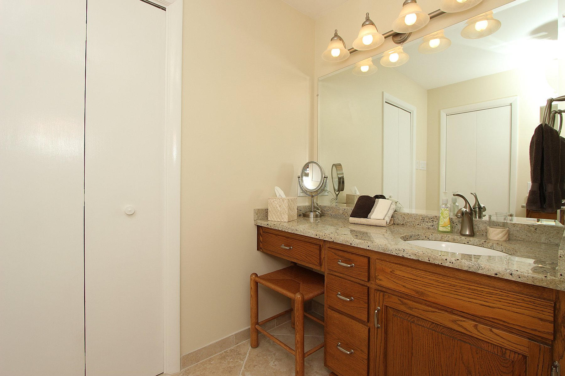 840 Brushy Ridge Road Salem, VA 24153 - Photo 45 of 86 a bathroom with a granite countertop sink a light fixture and a mirror