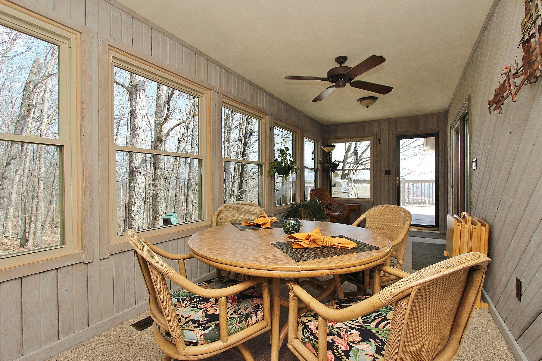 840 Brushy Ridge Road Salem, VA 24153 - Photo 58 of 86 a dining room with furniture a chandelier and a large window