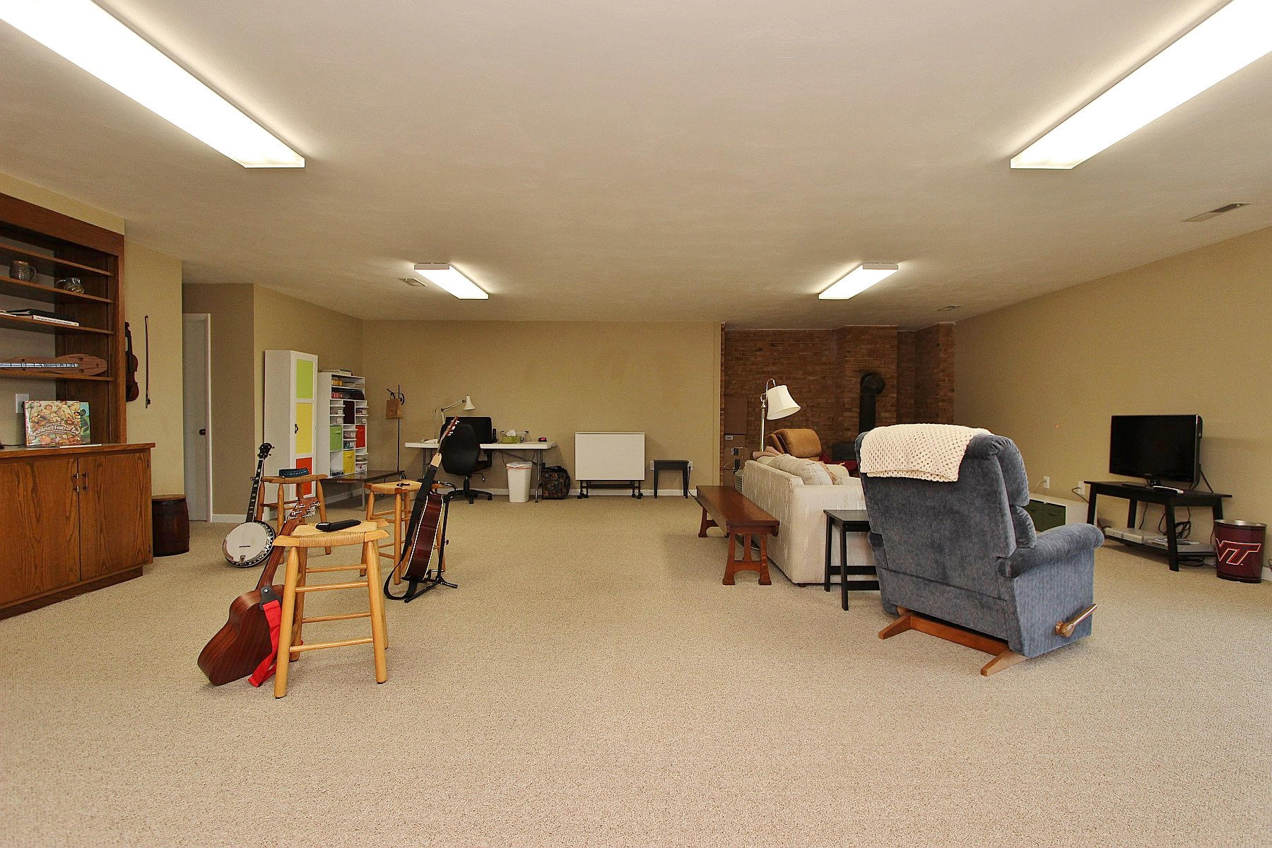 840 Brushy Ridge Road Salem, VA 24153 - Photo 71 of 86 a living room with furniture and a flat screen tv
