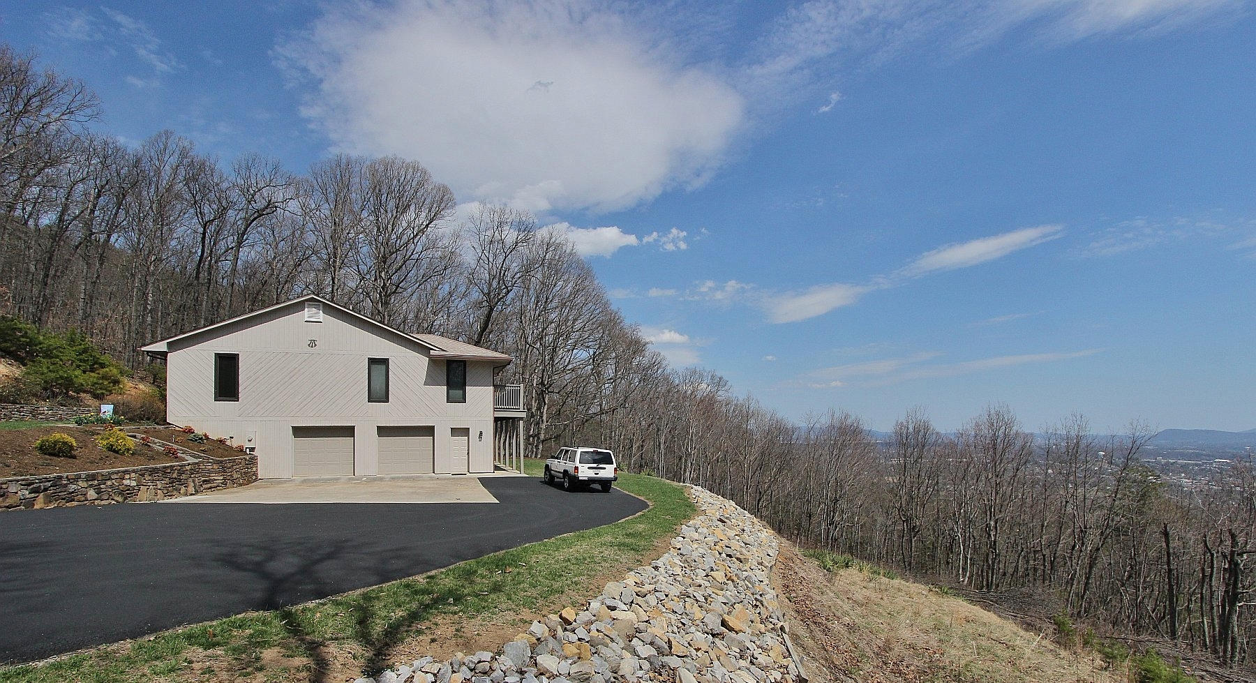 840 Brushy Ridge Road Salem, VA 24153 - Photo 85 of 86 a view of a white house next to a yard with large trees