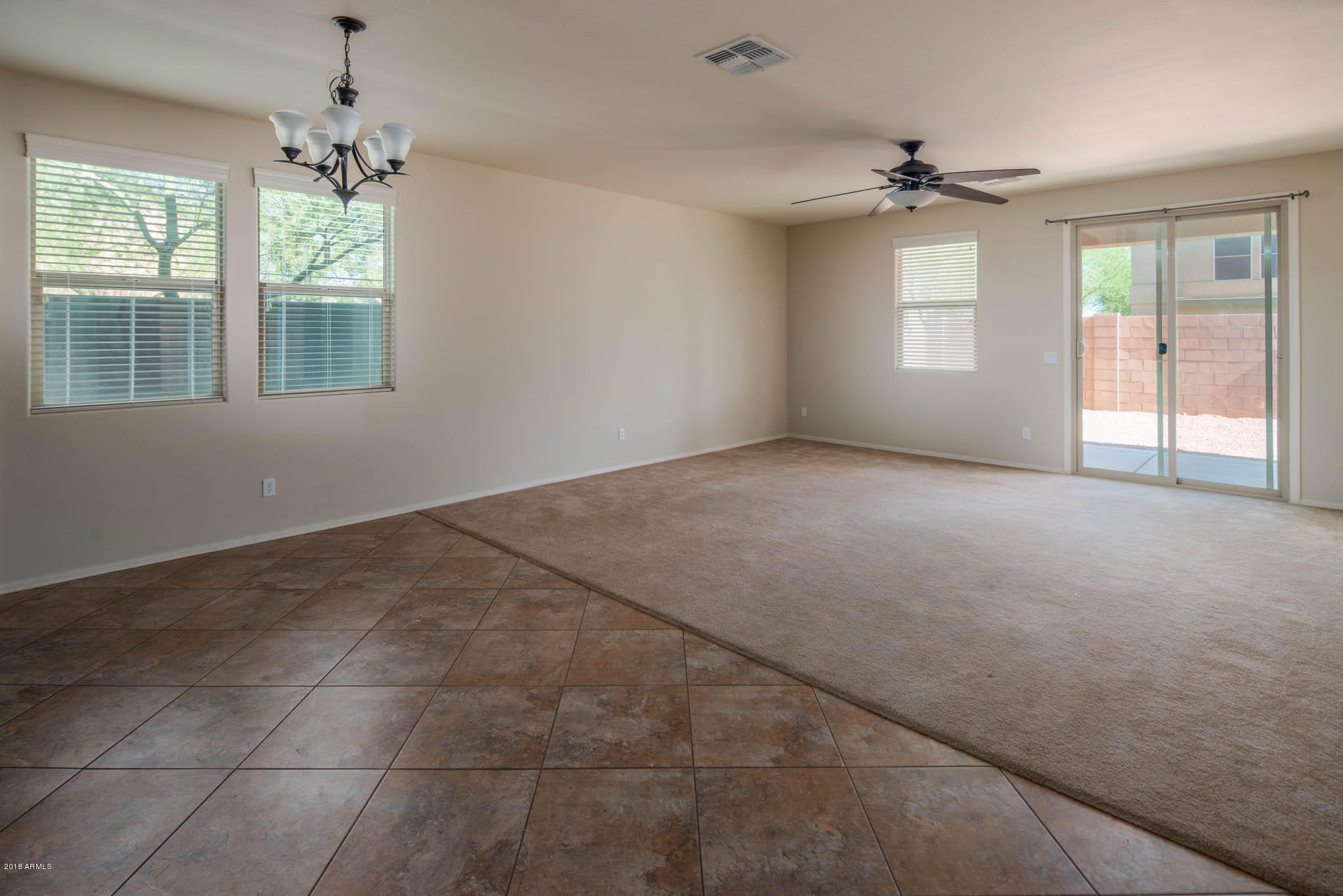 7863 West Redbird Road Peoria, AZ 85383 - Photo 14 of 43 a view of an empty room with a window