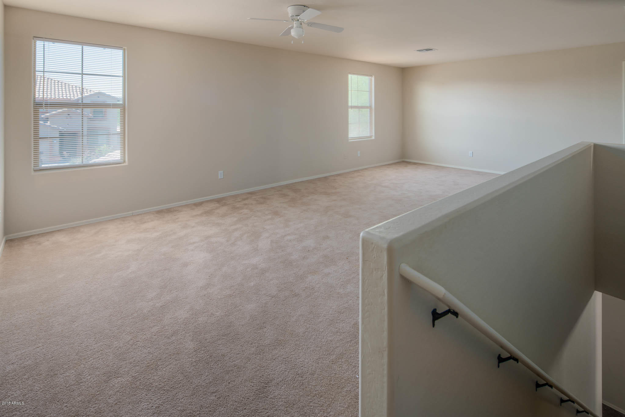 7863 West Redbird Road Peoria, AZ 85383 - Photo 21 of 43 a view of an empty room and window