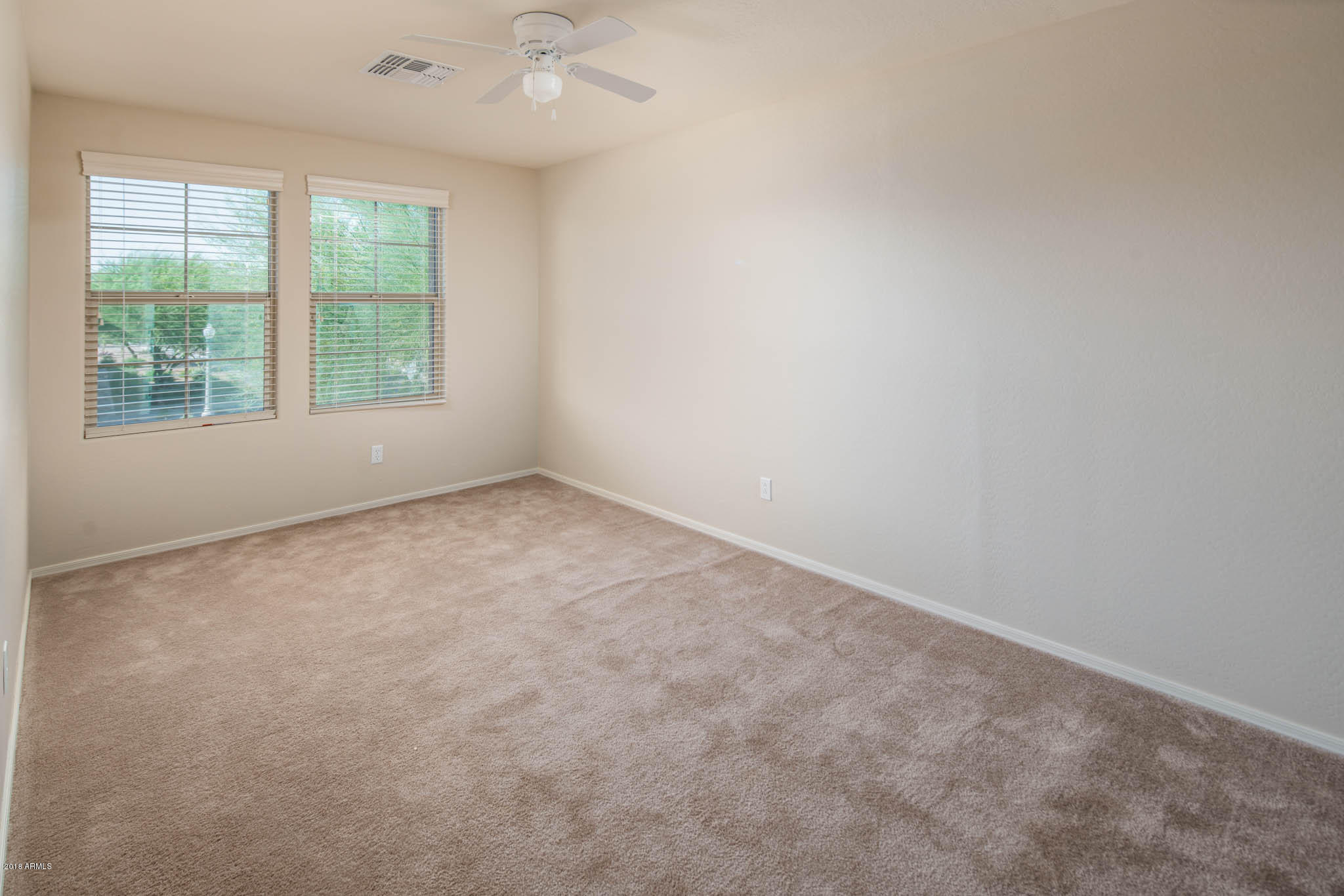 7863 West Redbird Road Peoria, AZ 85383 - Photo 22 of 43 an empty room with a window
