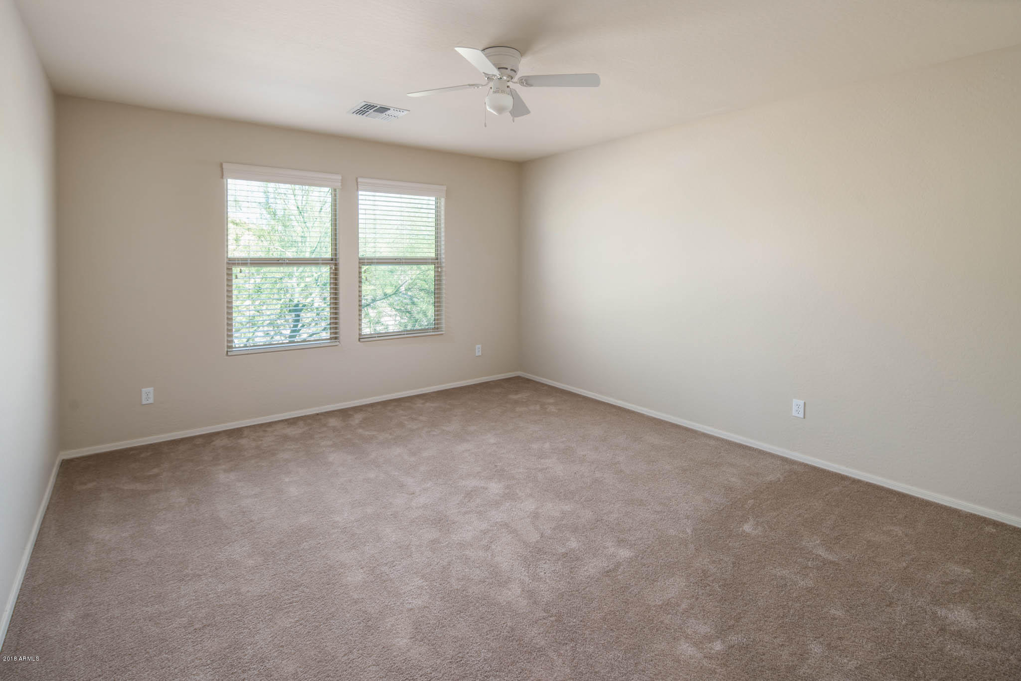 7863 West Redbird Road Peoria, AZ 85383 - Photo 24 of 43 an empty room with a window