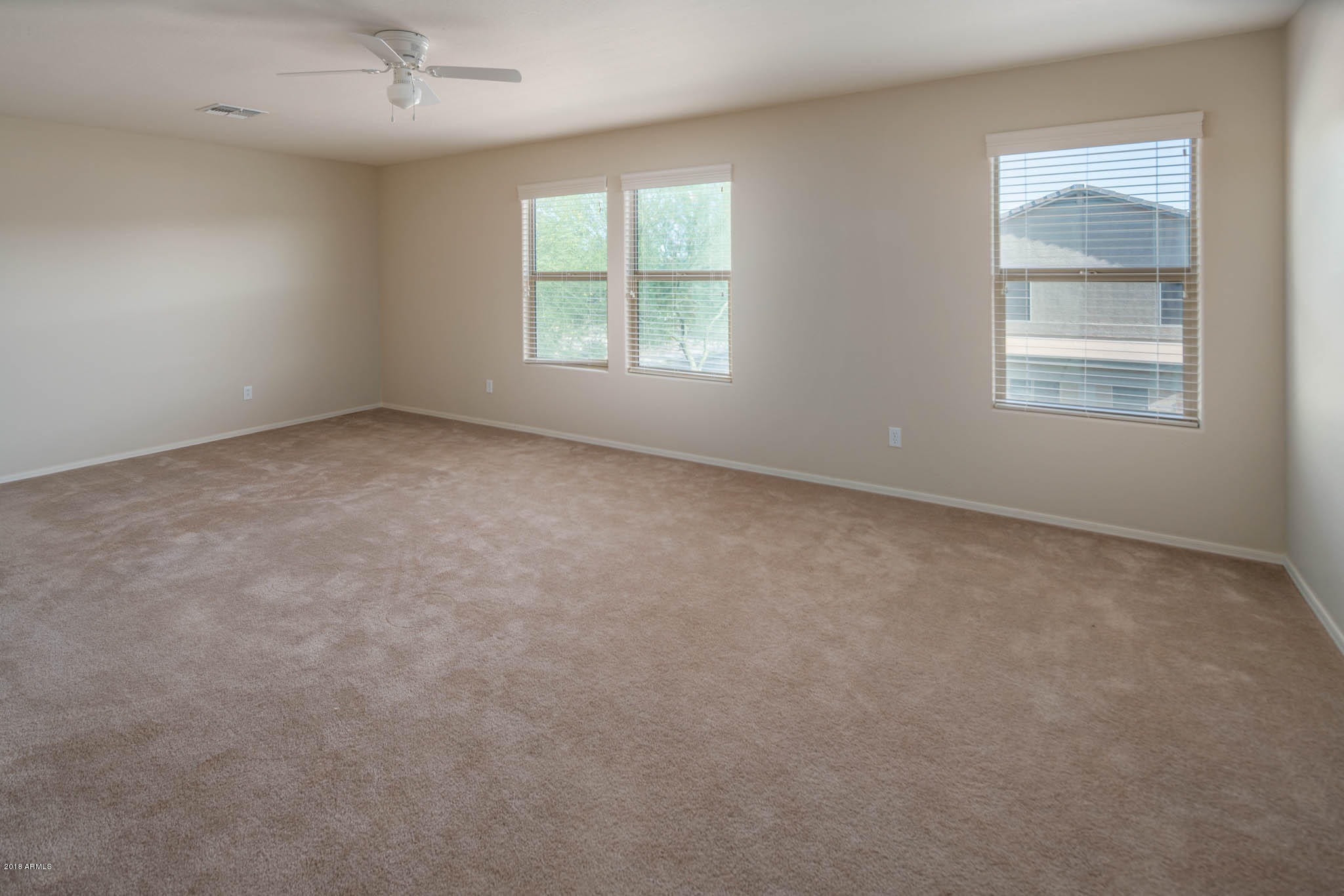 7863 West Redbird Road Peoria, AZ 85383 - Photo 26 of 43 an empty room with windows
