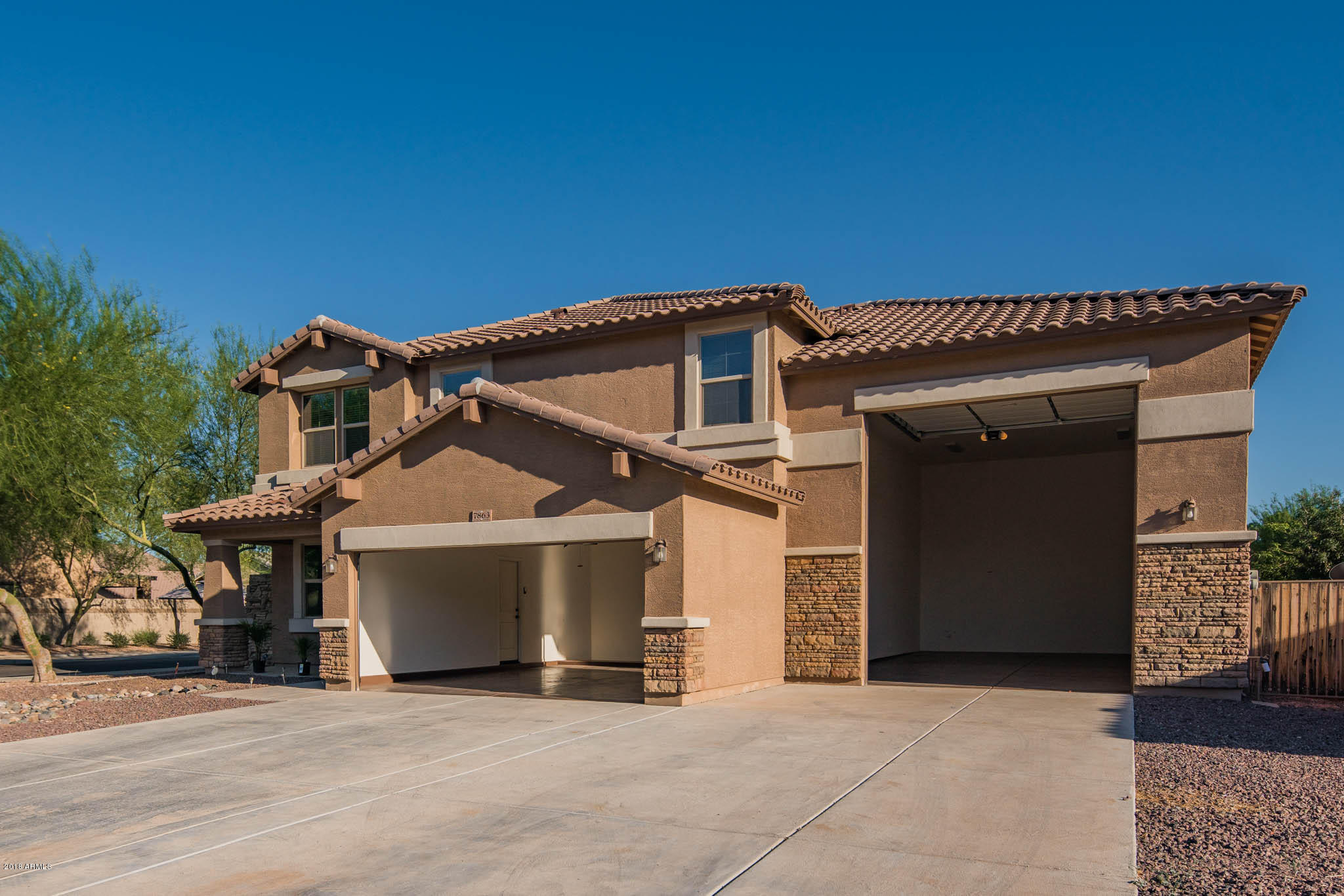 7863 West Redbird Road Peoria, AZ 85383 - Photo 33 of 43 a view of a house with a outdoor space