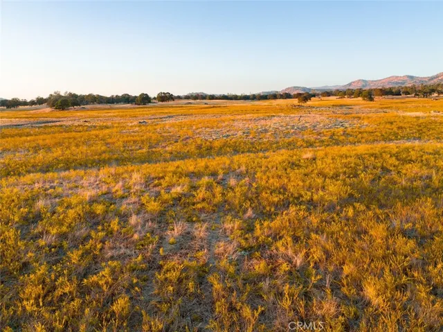 a view of an ocean from a mountain