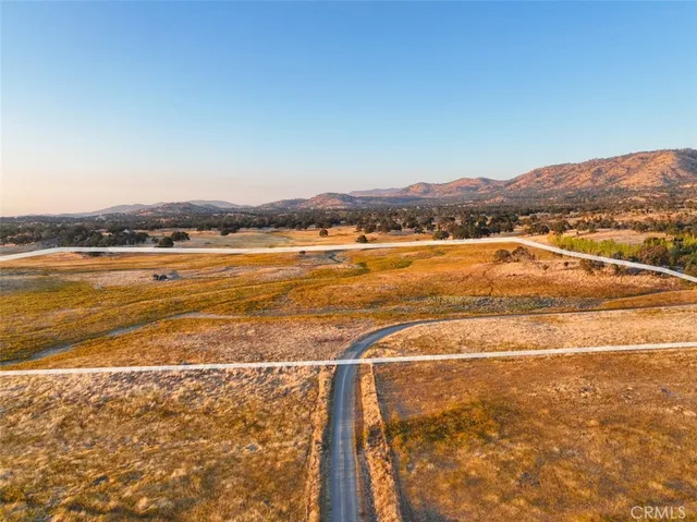 a view of an ocean and a mountain