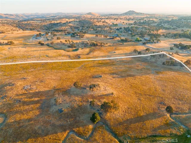 a view of an ocean and mountain