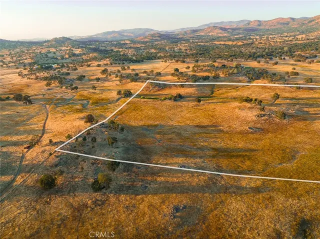 a view of an ocean and a mountain