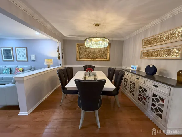 a living room with furniture a window and gym equipment