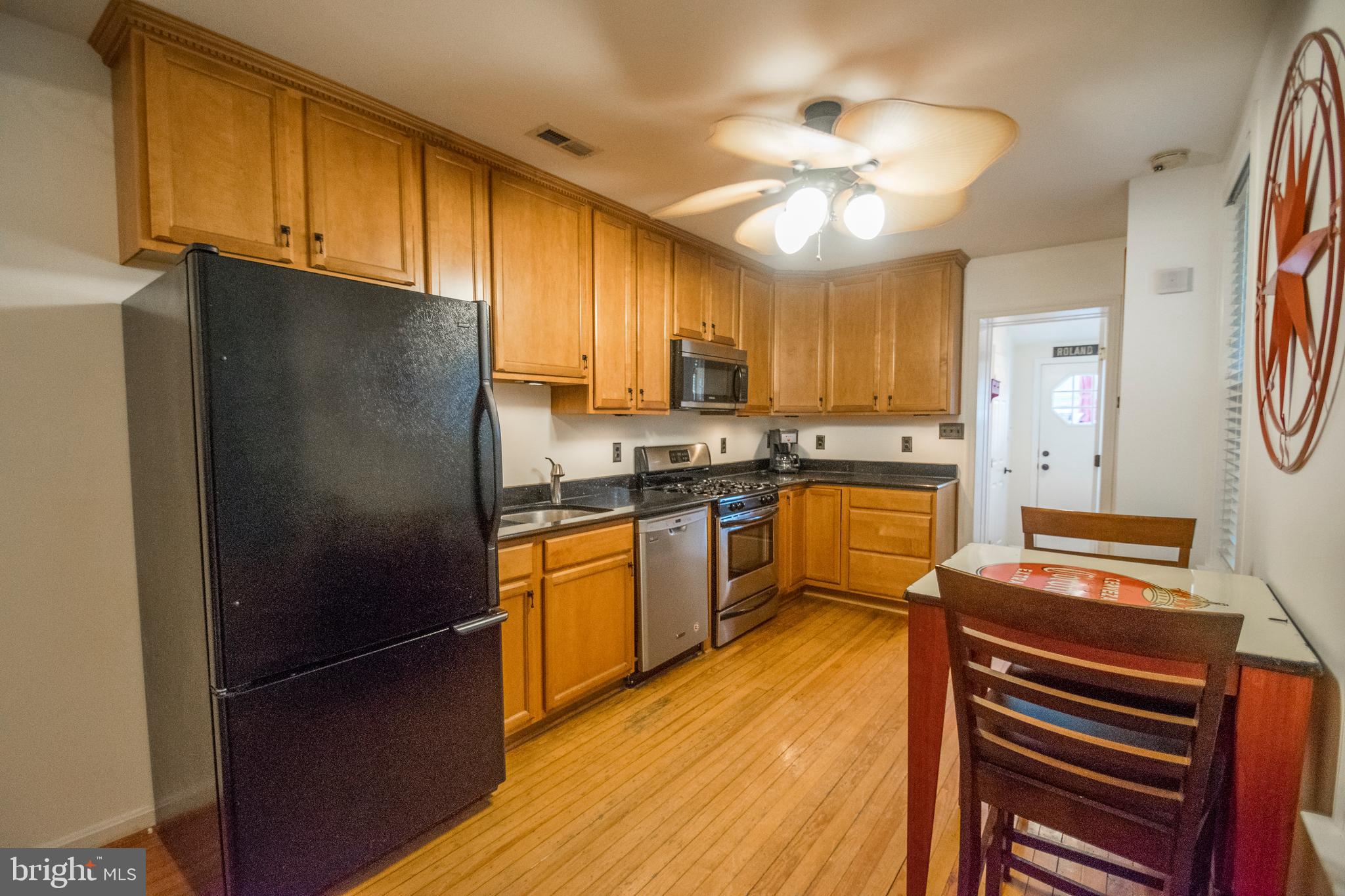 3612 Roland Avenue Baltimore, MD 21211 - Photo 12 of 53 Kitchen with door to mudroom