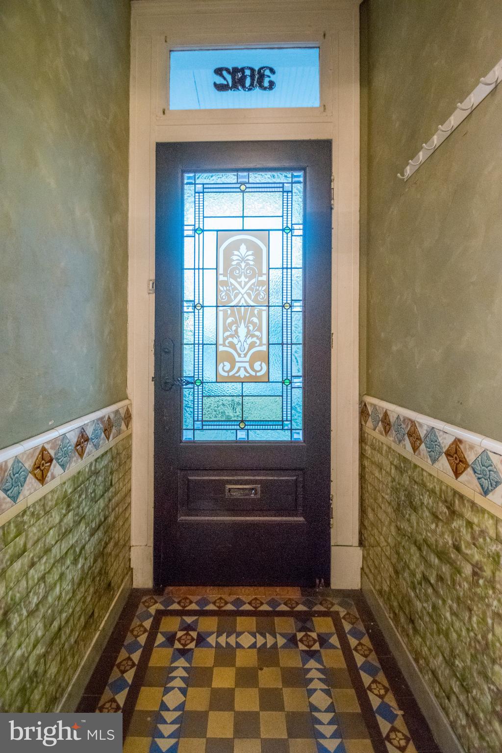 Entrance with original tile work