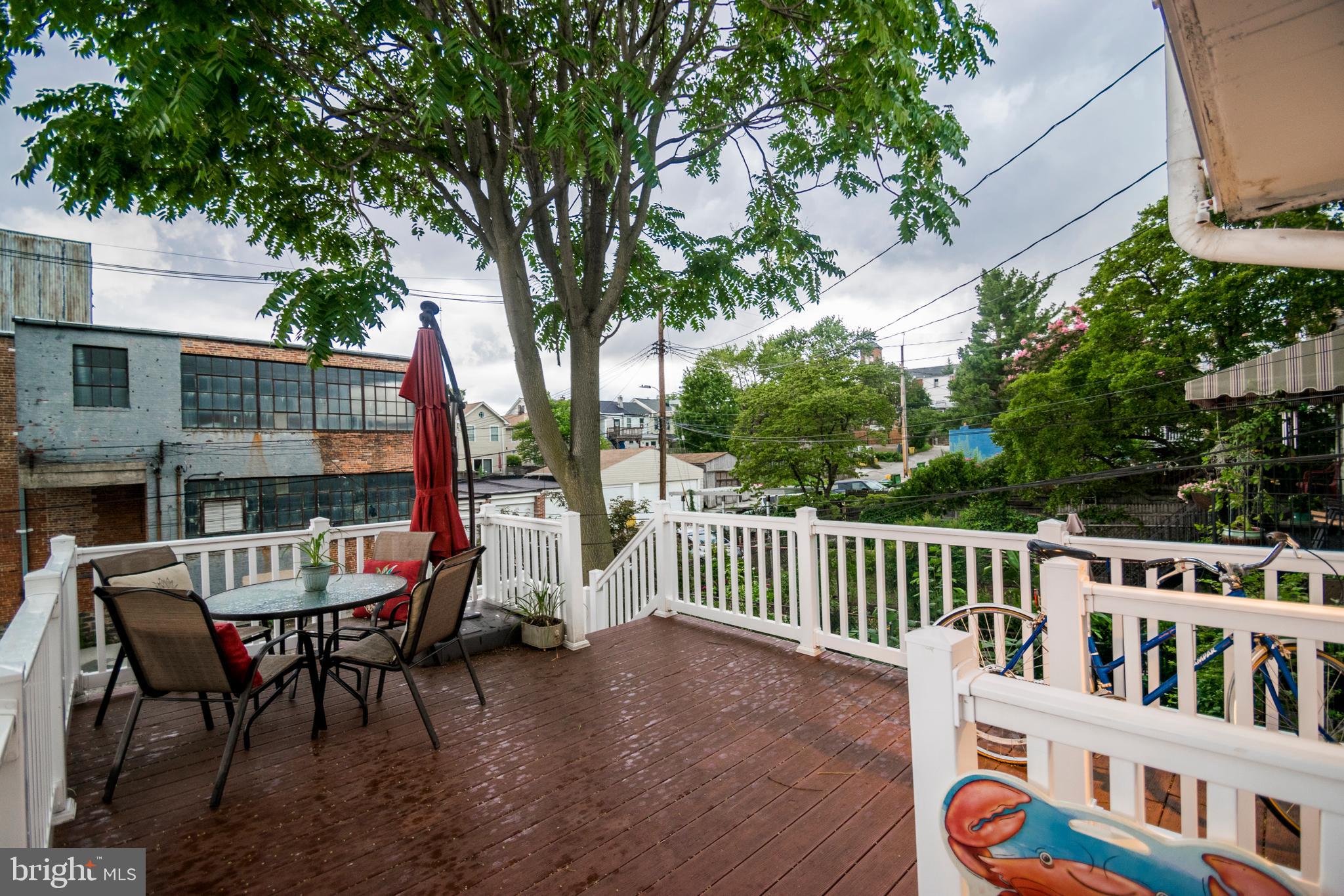 3612 Roland Avenue Baltimore, MD 21211 - Photo 48 of 53 Rear deck with stairs to parking area