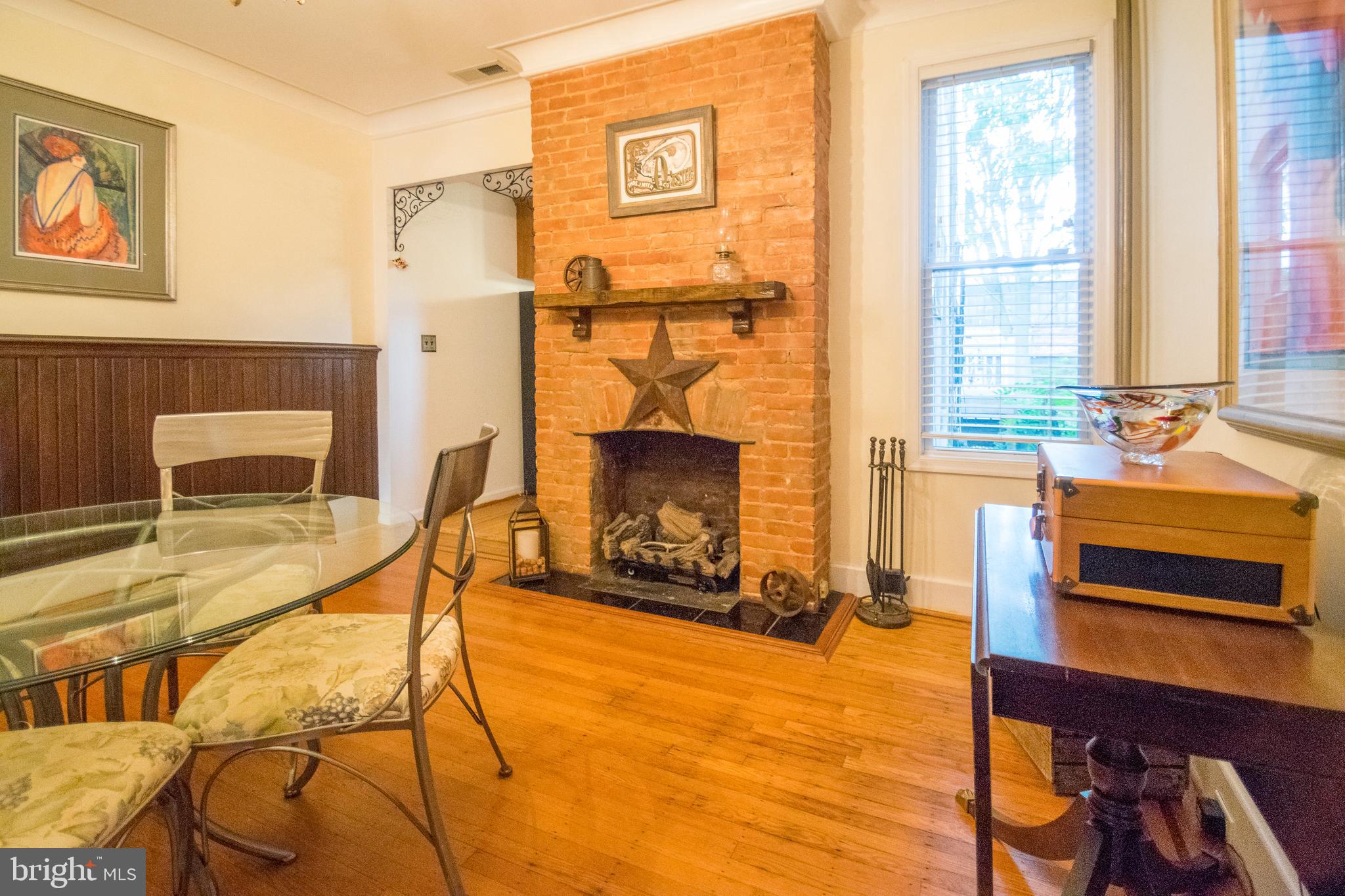 3612 Roland Avenue Baltimore, MD 21211 - Photo 9 of 53 Dining room with gas fireplace