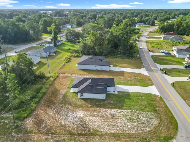a view of a lake with a swimming pool