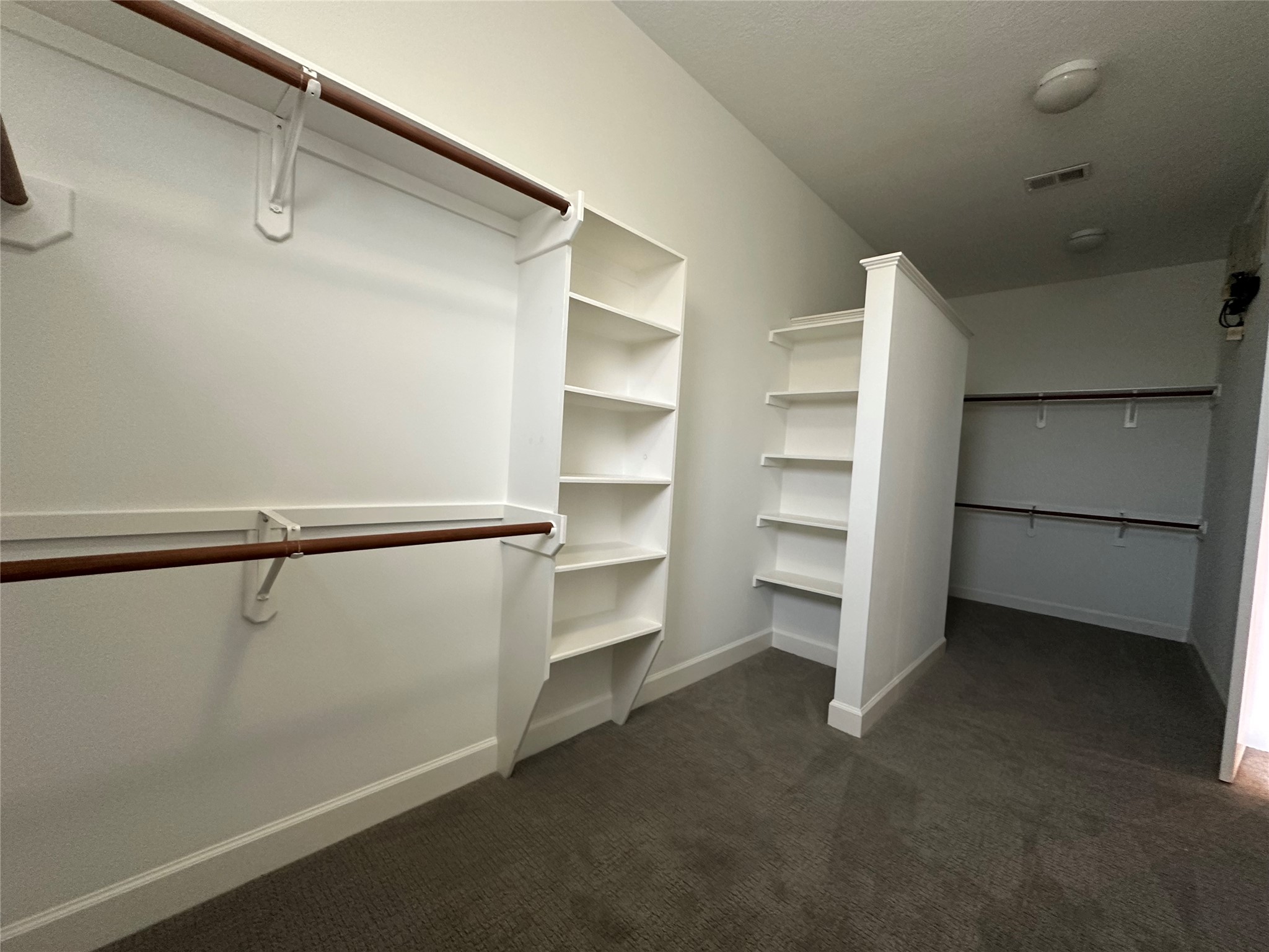 2713 Crawford Street Houston, TX 77004 - Photo 19 of 27 a view of an empty walk in closet