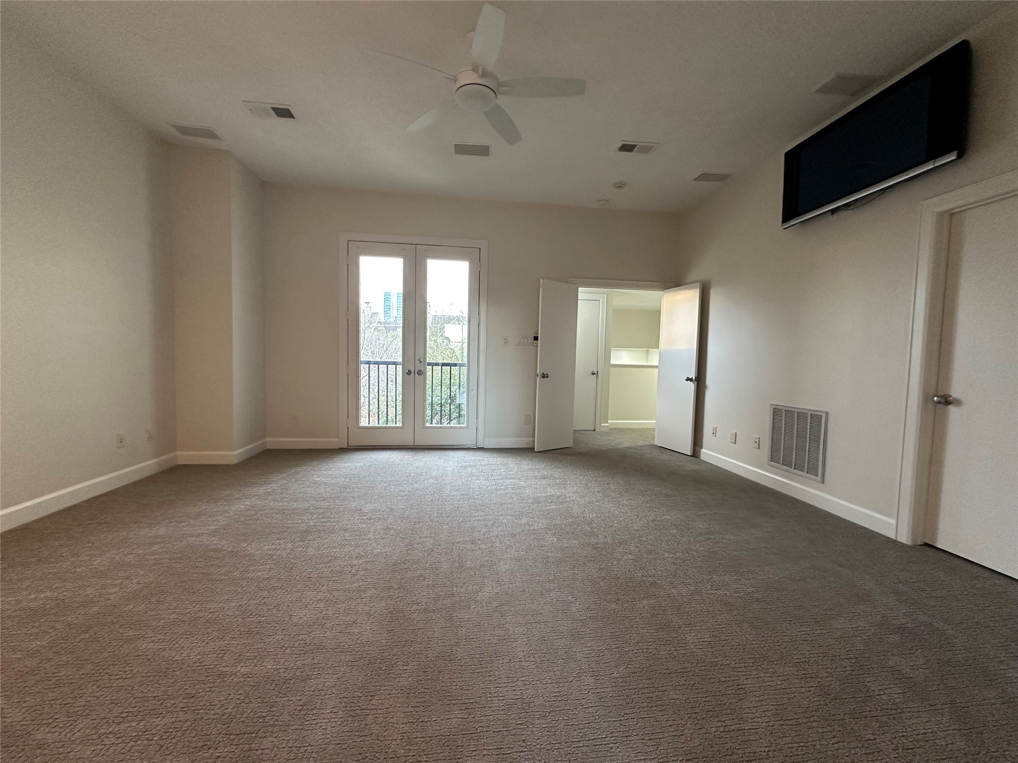 2713 Crawford Street Houston, TX 77004 - Photo 21 of 27 a view of a livingroom with an empty space and a window