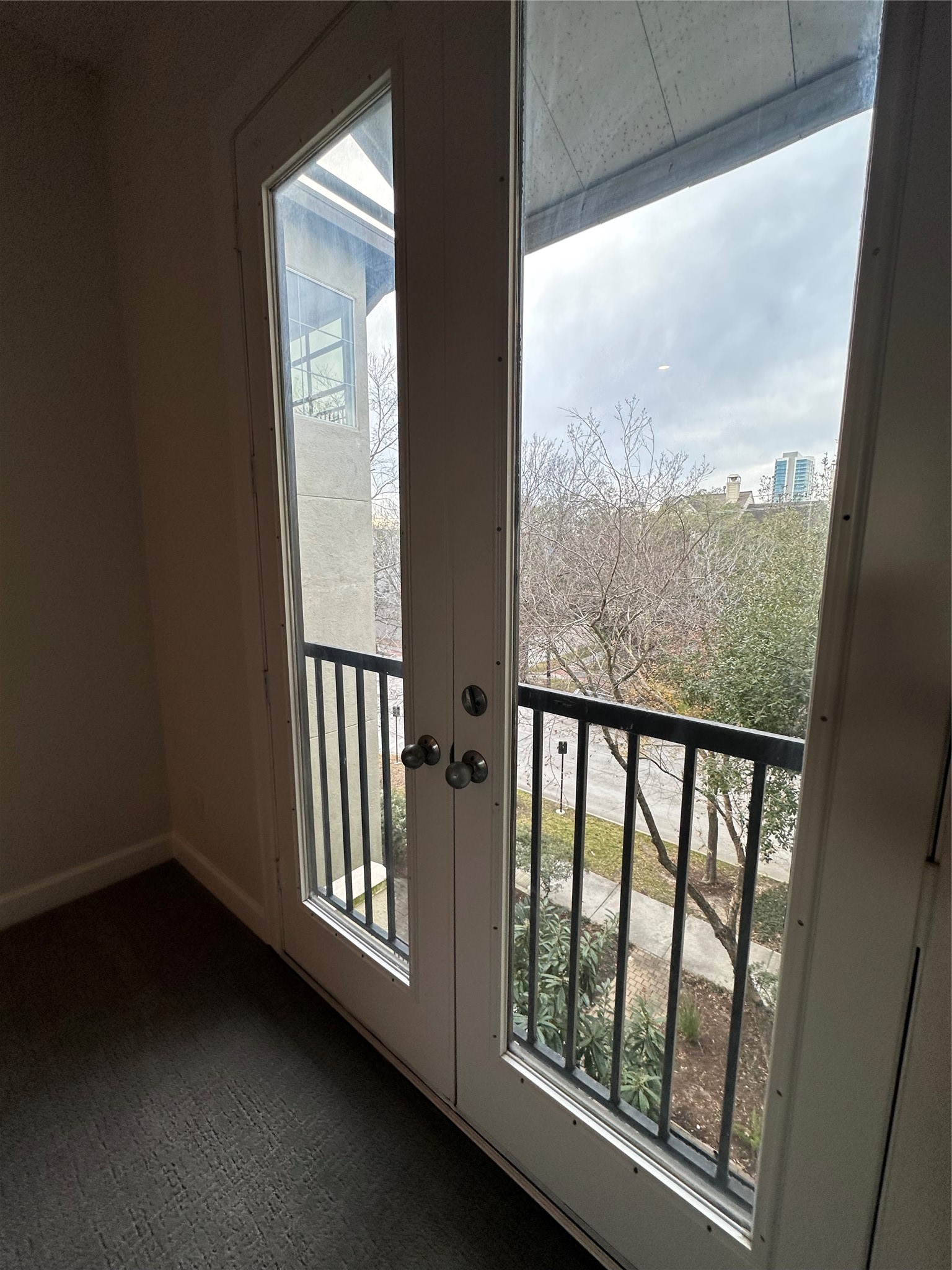 2713 Crawford Street Houston, TX 77004 - Photo 25 of 27 a view of a balcony with wooden floor