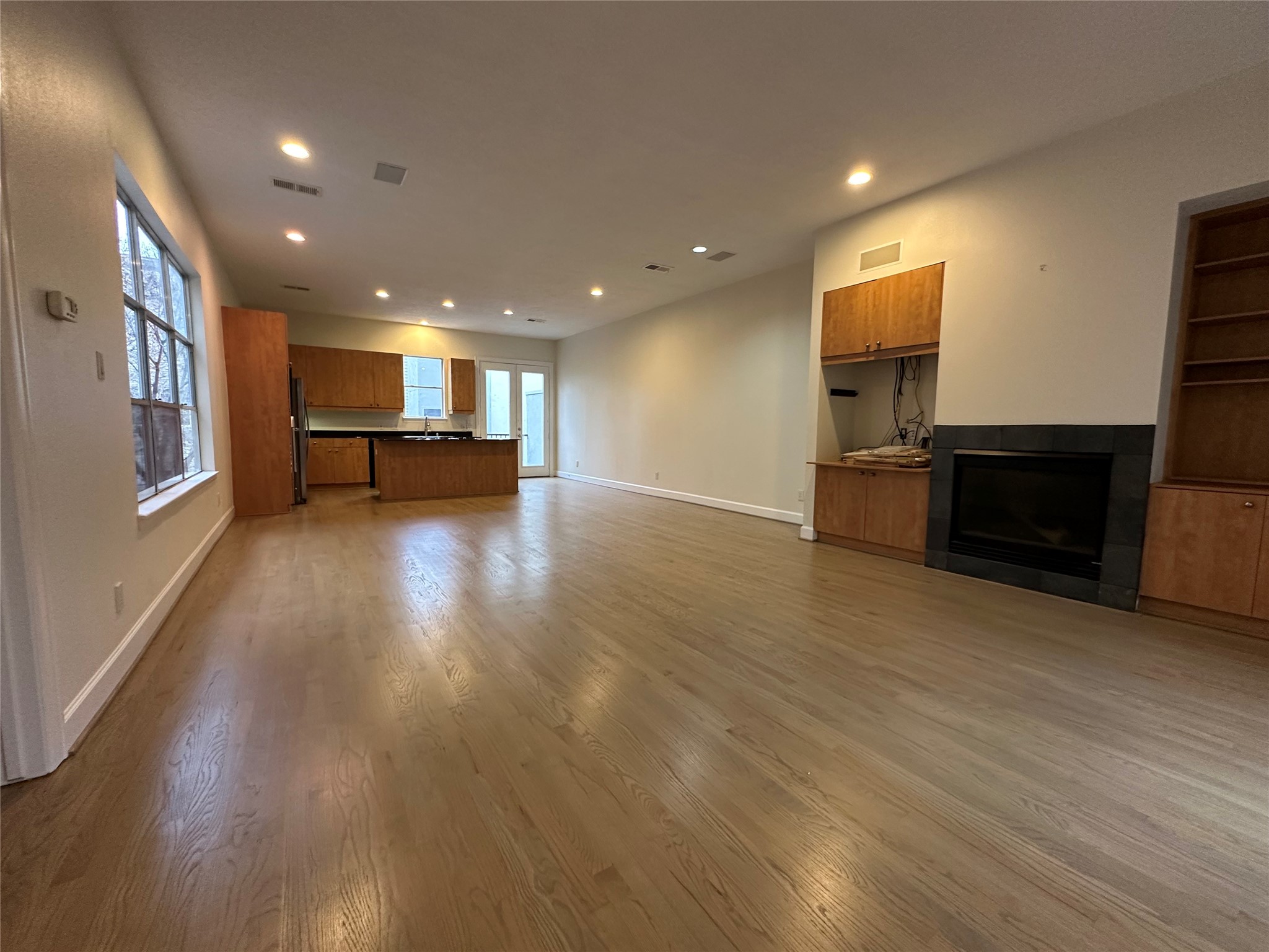 2713 Crawford Street Houston, TX 77004 - Photo 4 of 27 a view of kitchen with microwave and furniture