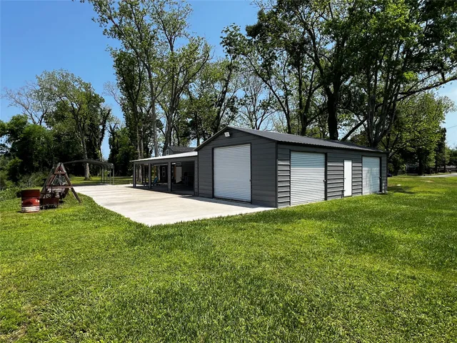 a view of a backyard with a garden