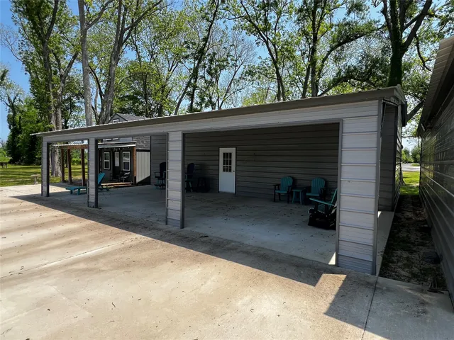 a park view with a bench in the lake