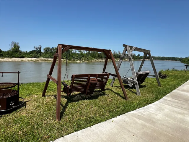 a view of backyard with green space