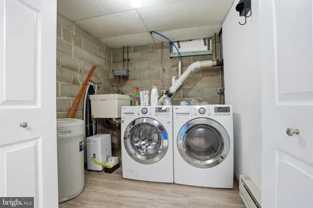 a utility room with dryer and washer