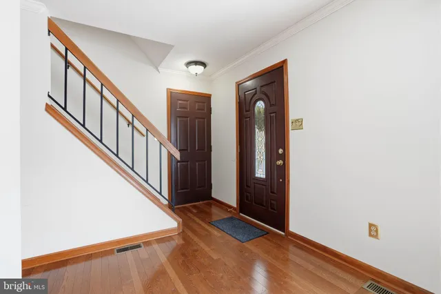 a view of an entryway with staircase