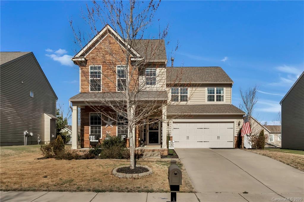1521 Ridgehaven Road Waxhaw, NC 28173 - Photo 1 of 29 a front view of a house with garden