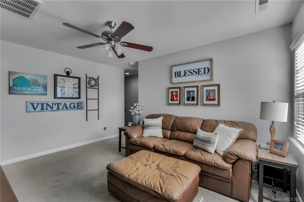 1521 Ridgehaven Road Waxhaw, NC 28173 - Photo 21 of 29 a living room with furniture