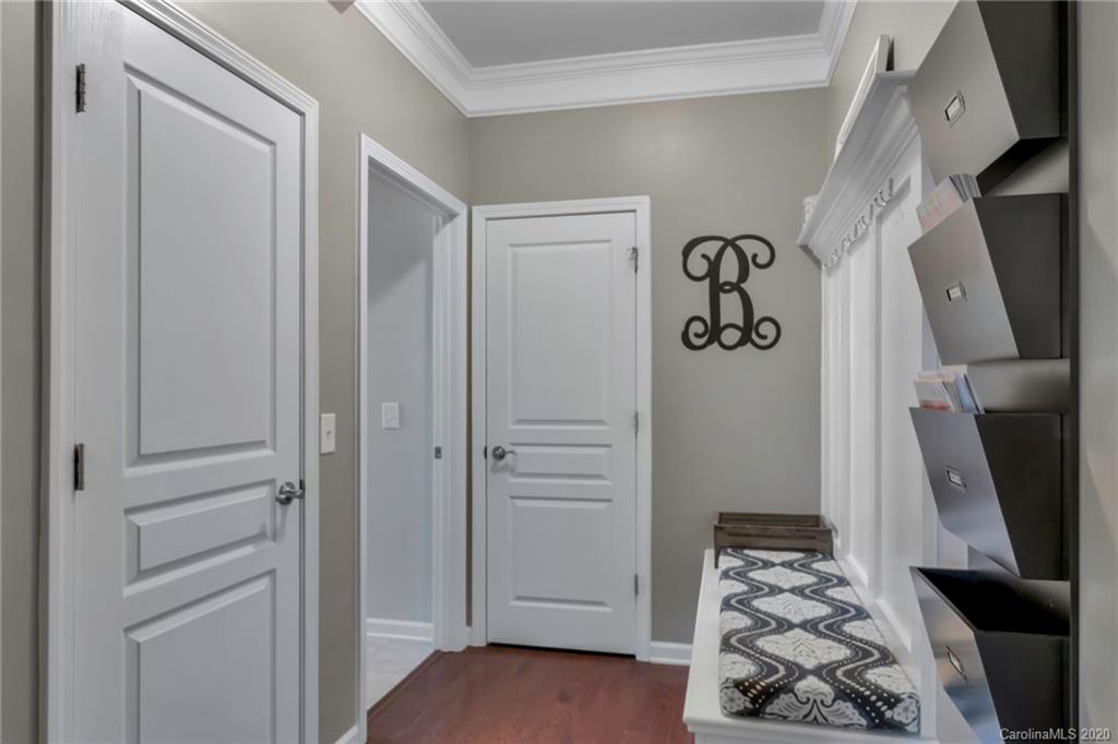 1521 Ridgehaven Road Waxhaw, NC 28173 - Photo 23 of 29 a view of walk in closet with clothes and shoes