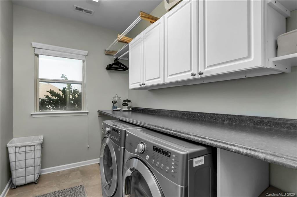 1521 Ridgehaven Road Waxhaw, NC 28173 - Photo 24 of 29 a utility room with dryer and washer