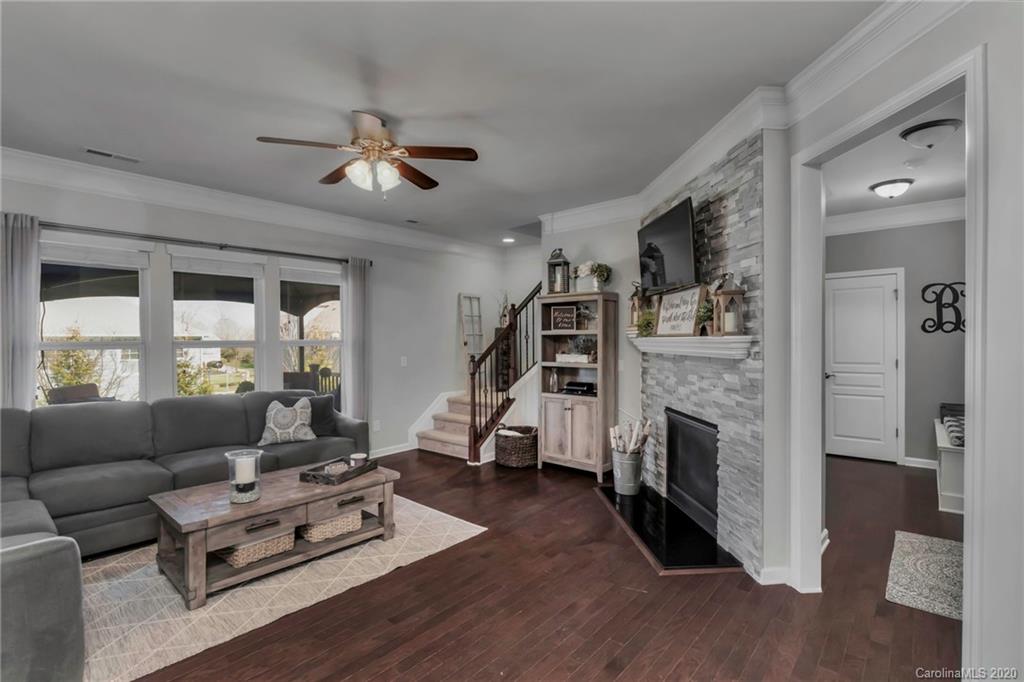 1521 Ridgehaven Road Waxhaw, NC 28173 - Photo 9 of 29 a living room with furniture and a fireplace