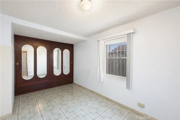 a view of a door with wooden floor