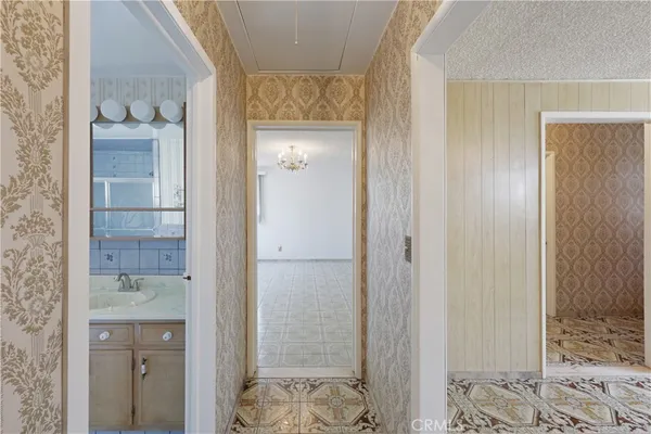 a bathroom with a shower and a sink