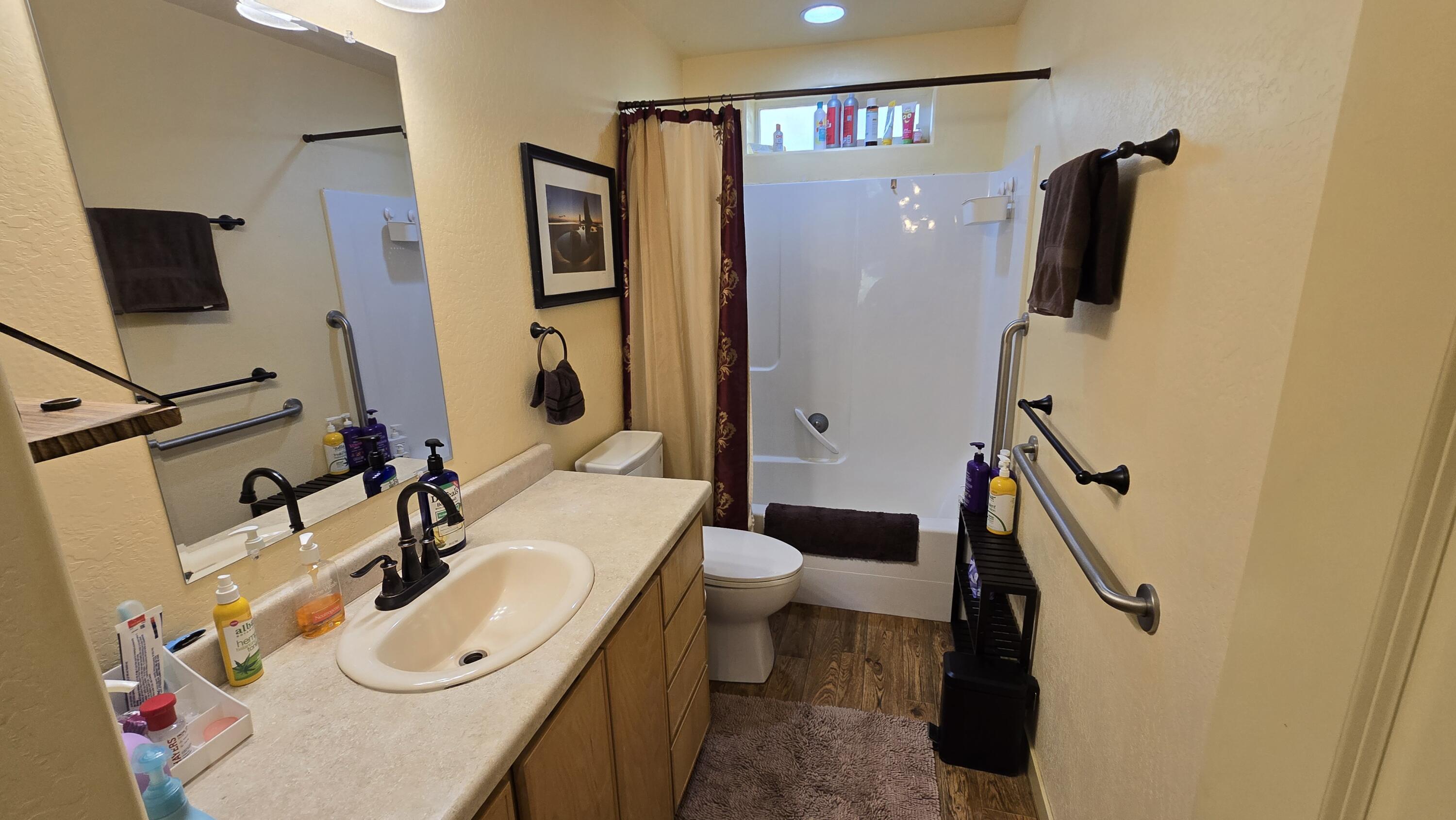 488 Crowson Road Ashland, OR 97520 - Photo 16 of 30 a bathroom with a sink a toilet and shower