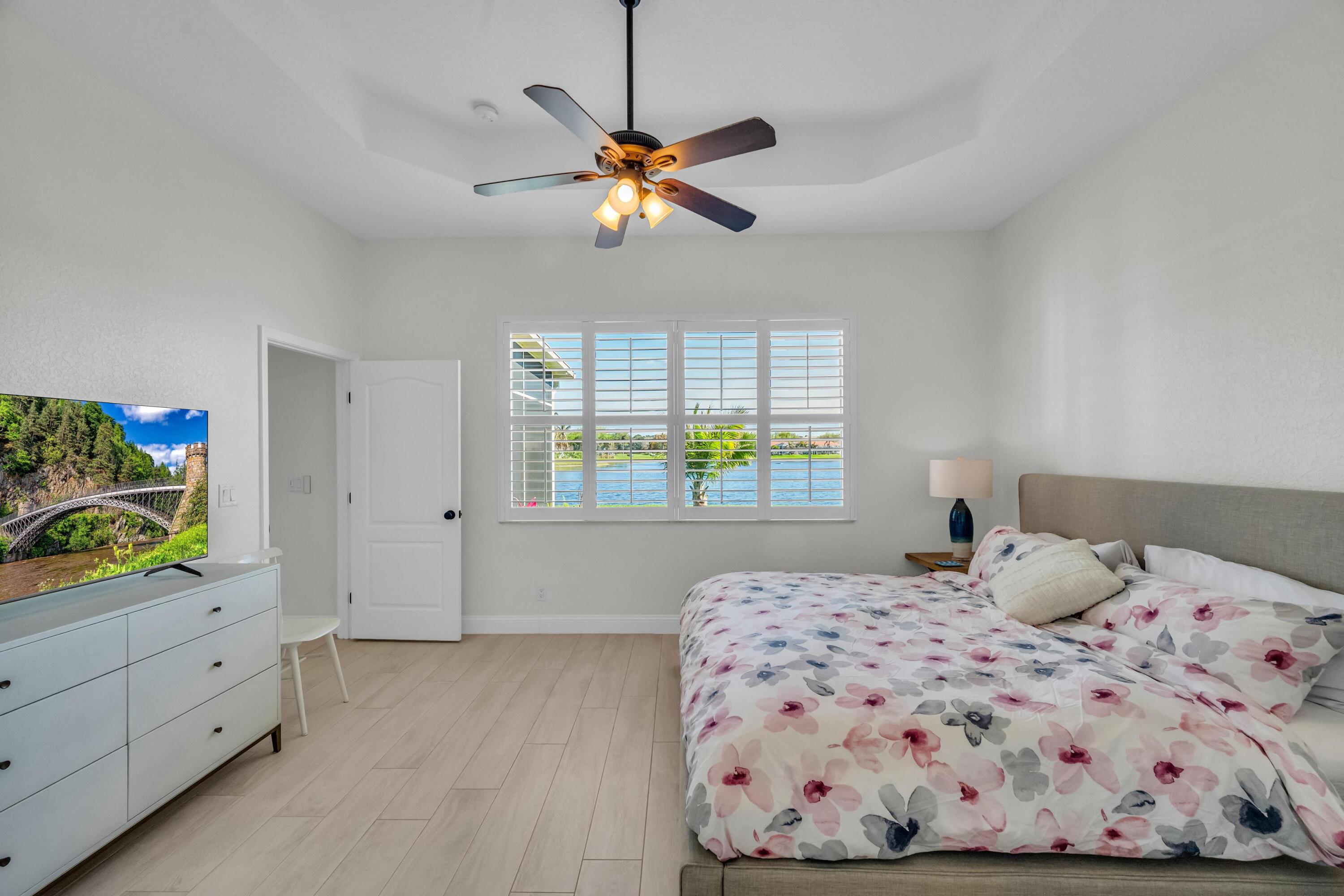 5902 Walnut Park Lane Fort Pierce, FL 34951 - Photo 18 of 45 a bedroom with a bed and window