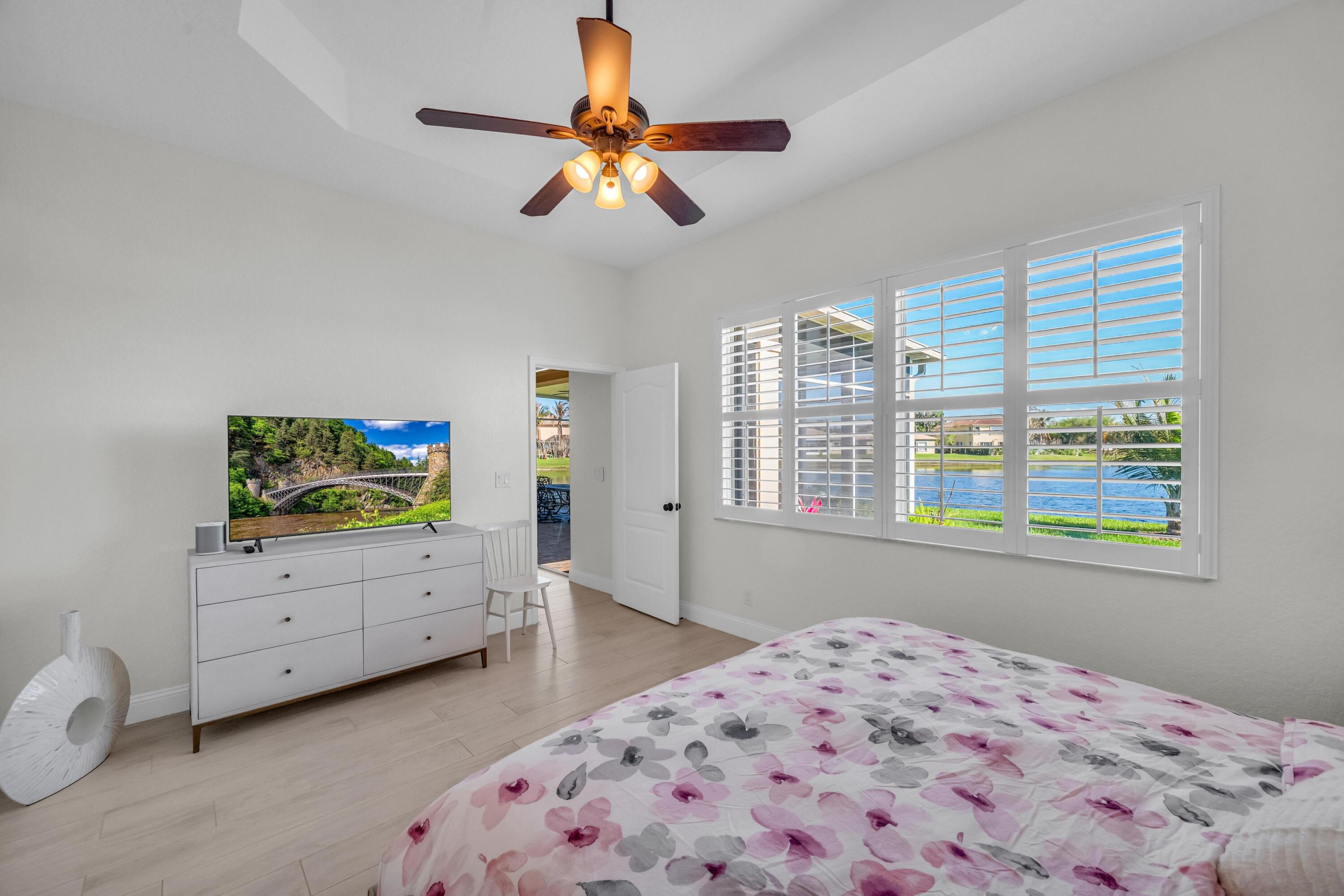 5902 Walnut Park Lane Fort Pierce, FL 34951 - Photo 19 of 45 a bedroom with bed and window