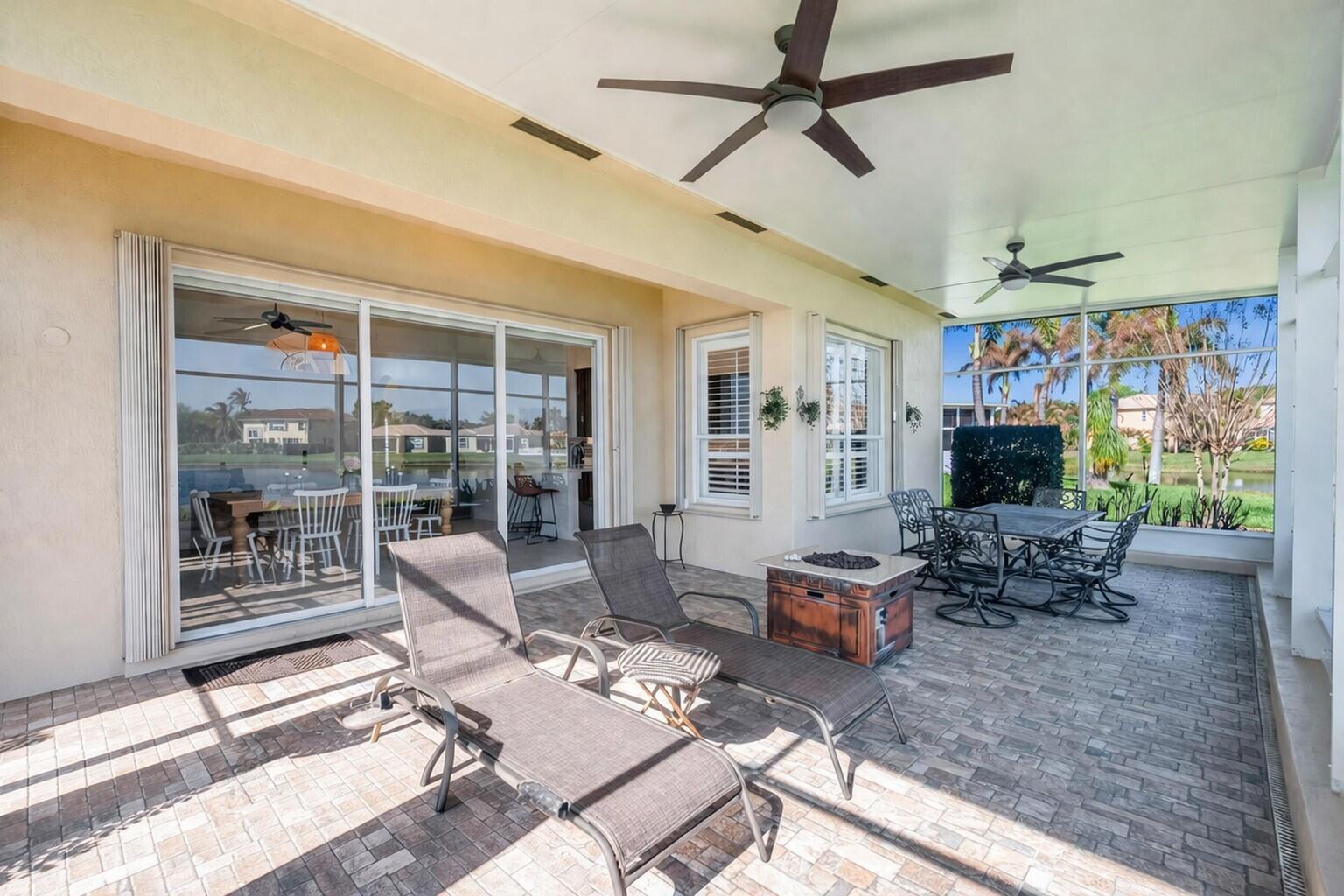 5902 Walnut Park Lane Fort Pierce, FL 34951 - Photo 32 of 45 a living room with furniture and a fireplace