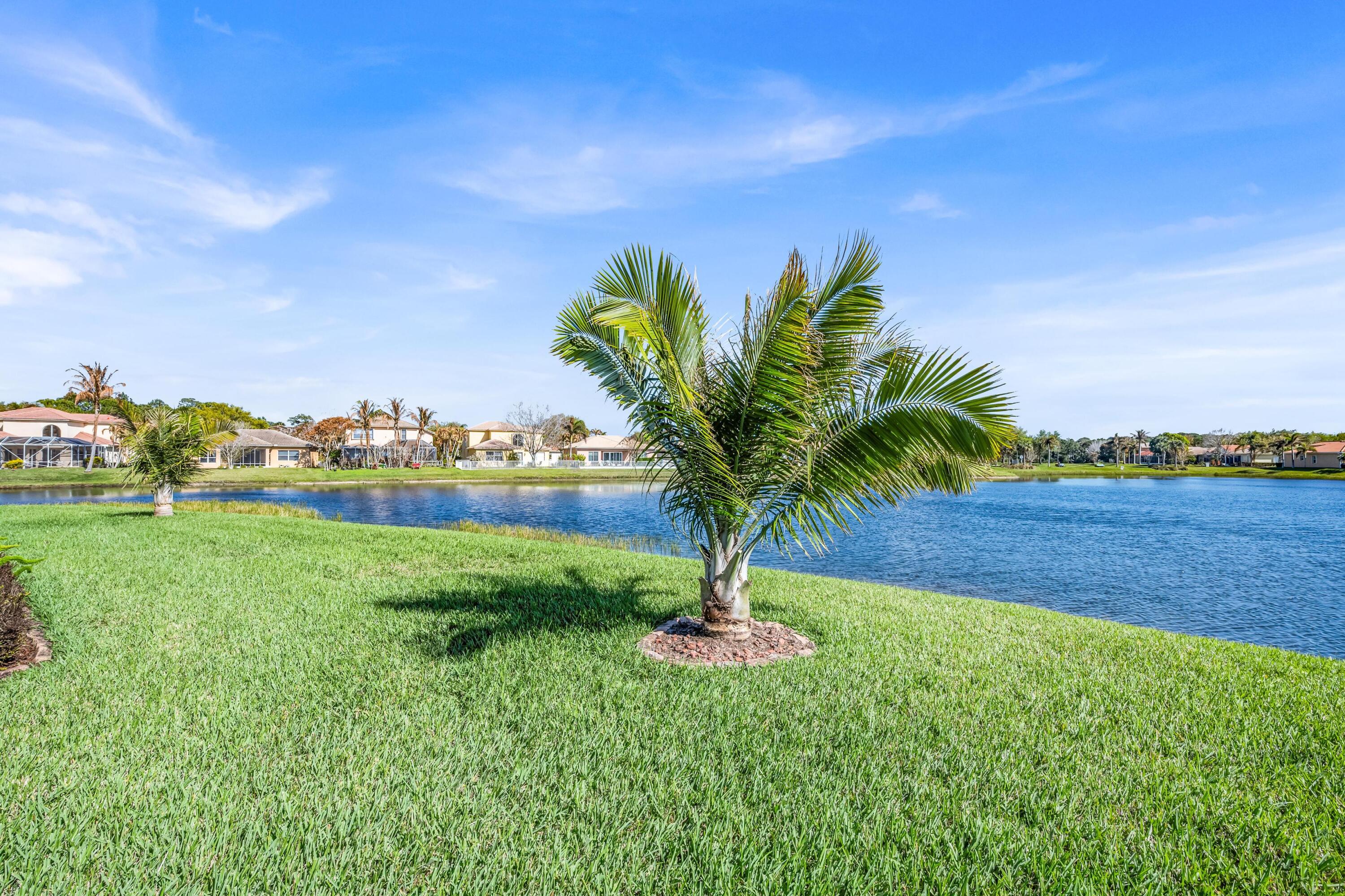 5902 Walnut Park Lane Fort Pierce, FL 34951 - Photo 35 of 45 a view of a garden with a tree