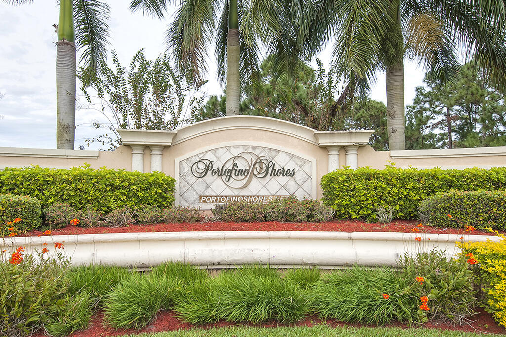 5902 Walnut Park Lane Fort Pierce, FL 34951 - Photo 40 of 45 a view of a sign in a yard with palm trees