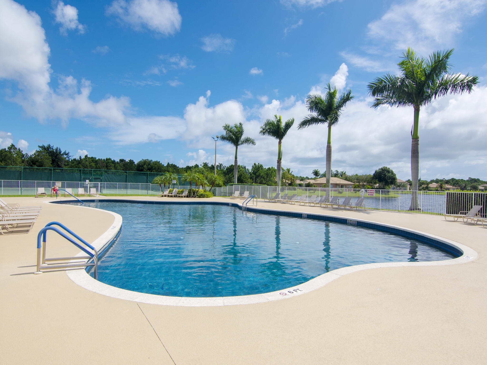 5902 Walnut Park Lane Fort Pierce, FL 34951 - Photo 43 of 45 a view of a swimming pool with a yard and plants