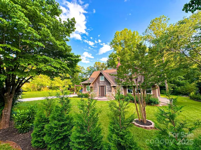 a house view with a garden space