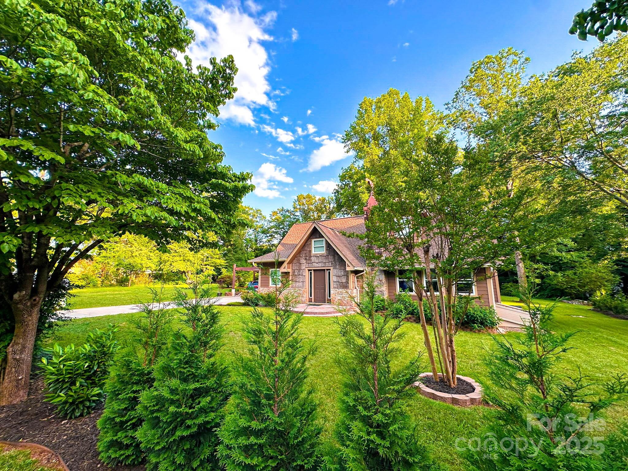 141 Carnegie Road Rutherfordton, NC 28139 - Photo 2 of 48 a house view with a garden space
