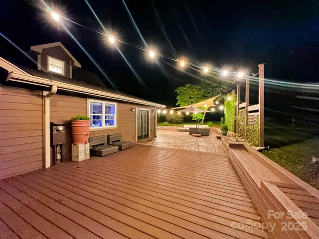 a view of a hall with wooden floor