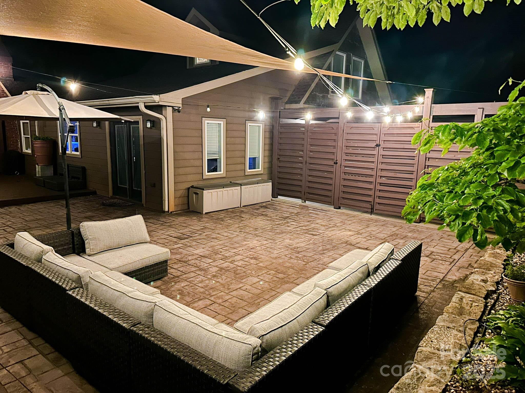 141 Carnegie Road Rutherfordton, NC 28139 - Photo 43 of 48 a terrace with outdoor seating and trees